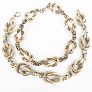 lot 101 image: Set Of 2 VINTAGE Art Deco Two-Tone Reef Knot Rose And Yellow Gold Filled Link Bracelet.