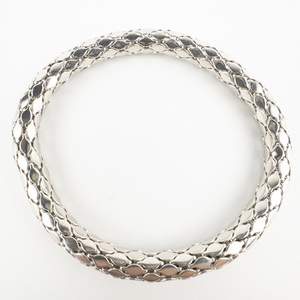 lot 113 image: Stretchy Entwined Silver Tone Base Metal Bracelet.