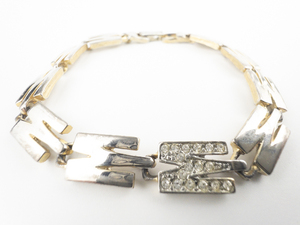 lot 115 image: Solid & Rhinestone M Gold Plated Base Metal Baby Bangle Bracelet.