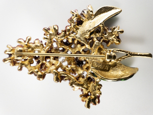 lot 131 image: Museum of Fine Arts Lilac Spring Flower Enamel Gold Tone Base Metal Brooch.