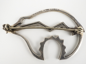 lot 134 image: Taxco, Mexico Heartline Bear Cutout Sterling Silver Brooch.