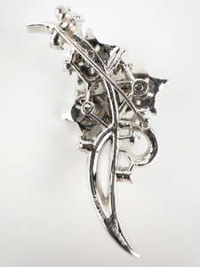 lot 136 image: CROWN TRIFARI ALFRED PHILIPPE Twinkle Collection Rhinestone Flower Rhodium Plated Base Metal Brooch.