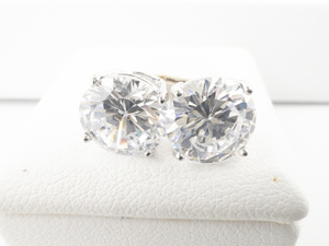 lot 149 image: Various Makers Group Of 4 CZ Sterling Silver & Base Metal Stud Earrings.