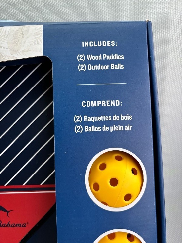lot 17A image: Brand New Tommy Bahama Pickleball Set with 2 Wood Paddles and 2 Outdoor Balls N