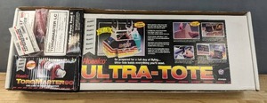 lot 30C image: Brand New Hobbico for RC Airplanes Ultra-Tote, TorqMaster90 Deluxe 12 Volt Starter, TorqMaster LC Maintenance Free Battery, Deluxe Power Panel II, Filling Station Fuel Can Fitting Set, High-Quality Accessories and Panel-Ready Top Fueler MkIII V