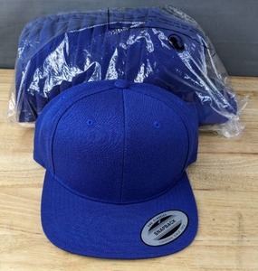 lot 32A image: 24 Brand New Yupoong Classics Snap Back Royal Blue Hats OSFM A