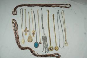 lot 1 image: Medallion necklace lot