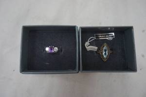 lot 51 image: Sterling silver rings, size 10 and 9 (left)