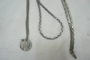lot 60 image: Vintage necklaces, Indianhead and gold plated