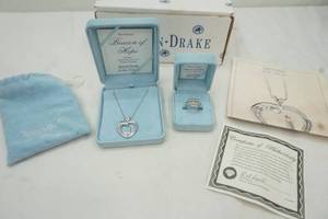 lot 63 image: Ashton Drake Beacon of Hope jewelry 925