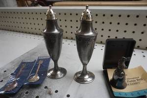 lot 74 image: Monroe silver company salt and pepper, Potter bell and spoons