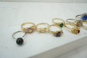 lot 95 image: Gold Tone rings