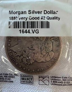 lot 25 image: 1880 MORGAN SILVER DOLLAR VERY GOOD