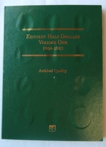lot 12 image: KENNEDY HALF DOLLAR BOOKLET1964-1985 28 COINS FROM THE COLLECTION