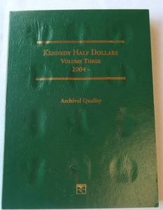 lot 14 image: KENNEDY HALF DOLLAR BOOKLET 2004-PRESENT 4 COINS