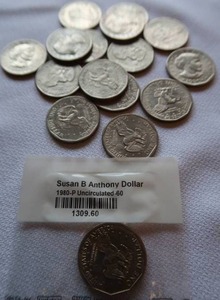 lot 35 image: 16 SUSAN B ANTHONY DOLLARS. 1 UNCIRCULATED