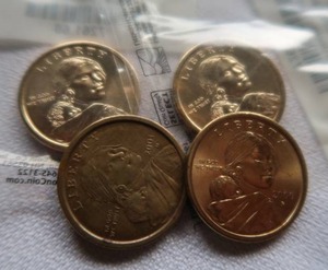 lot 45 image: 4 SACAGAWEA GOLD DOLLAR COINS