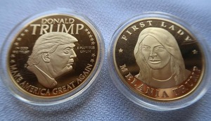 lot 51 image: COMMEMORATIVE DONALD TRUMP AND MELANIA COINS