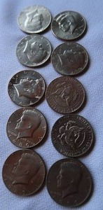 lot 53 image: 10 ASSORTED KENNEDY  HALF DOLLARS