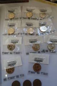 lot 58 image: 20 UNCIRCULATED PRESIDENTIAL GOLDEN DOLLARS