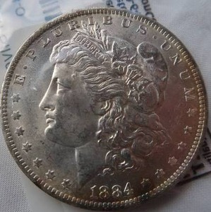 lot 74 image: 1884-O MORGAN SILVER DOLLAR