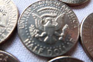 lot 86 image: 10 ASSORTED KENNEDY  HALF DOLLARS