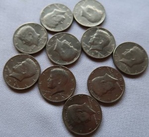 lot 92 image: 10 KENNEDY HALF DOLLARS, DATED 1973