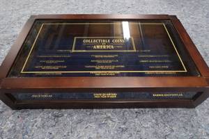 lot 100 image: COLLECTIBLE COINS OF AMERICA BOX