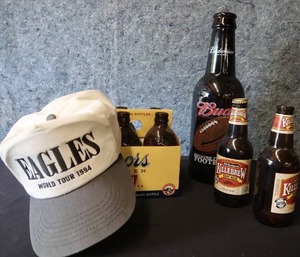 lot 163 image: EAGLES WORLD TOUR HELL FREEZES OVER HAT  COLLECTIBLE BEER BOTTLES