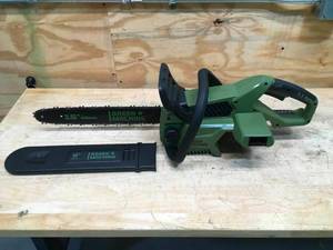 lot 25 image: Green Machine 62V Brushless 16 in. Battery Chainsaw with 2.5Ah battery and charger Model # GMCS6200 (Retail $299)