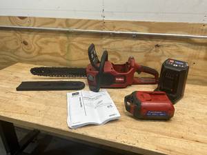 lot 81 image: TORO 60V MAX 16 in. (40.6 cm) Brushless Chainsaw with Charger and 2.5Ah Battery