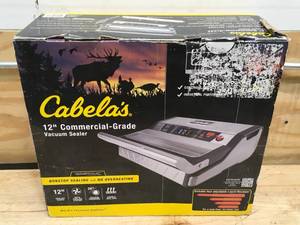 lot 92 image: Cabelas Commercial-Grade Vacuum Sealer Model # 541936 (Retail $299.99)