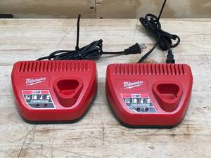 lot 97 image: Lot of 2 - Milwaukee m12 battery charger Model # 48-59-2401 (Retails $55 Each)