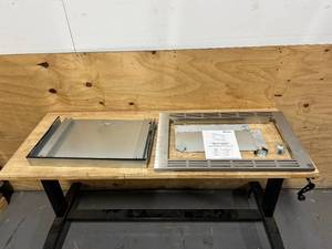 lot 158 image: PANASONIC 30 in. Wide Trim Kit for Panasonics 2.2 cu. ft. Microwave Ovens in Stainless Steel