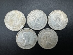 Five Canadian 80% Silver Quarters