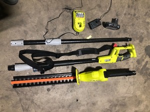 RYOBI ONE 18V 18 in. Cordless Battery Pole Hedge Trimmer with 2.0 Ah Battery and Charger   Customer Returns See Pictures