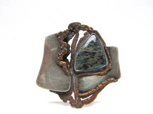 lot 7 image: Vintage Brutalist Sterling Silver Coper & Greenstone Brooch