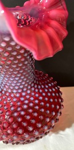 lot 75 image: Vintage Fenton Cranberry Hobnail Opalescent Ruffled Vase
