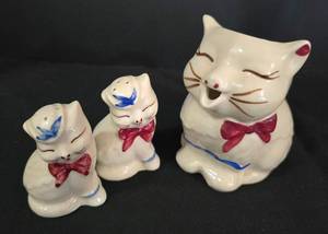 lot 129 image: Super Cute Puss & Boots Salt & Pepper and Creamer Group