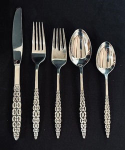 lot 7 image: Vintage Lyon Romanesque Stainless Flatware Service for Eight
