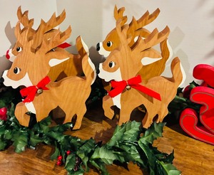lot 216 image: Happy Holiday 4 Wooden Reindeer, Red Sleigh, 2 Santa and Garland