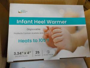 lot 25 image: 4 x 25 Infant Heel Warmers- good for all ages