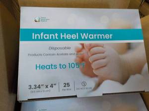 lot 26 image: 4 x 25 Infant Heel Warmers- good for all ages