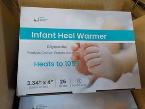lot 27 image: 4 x 25 Infant Heel Warmers- good for all ages