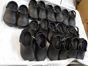 lot 63 image: 10 pair size 355 Black New Clogs...