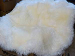 lot 2 image: Windward 100% Sheepskin rug 71x 64...