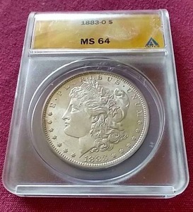 1883-O Morgan Dollar - ANACS MS64