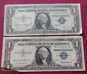 (2) 1957 Silver Certificate $1 Notes