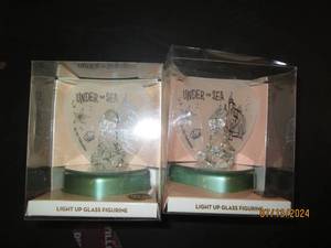2 light up figurines...