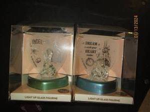 2 light up figurines...